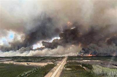 Wildfires threaten British Columbia town as Western Canada battles blazes 